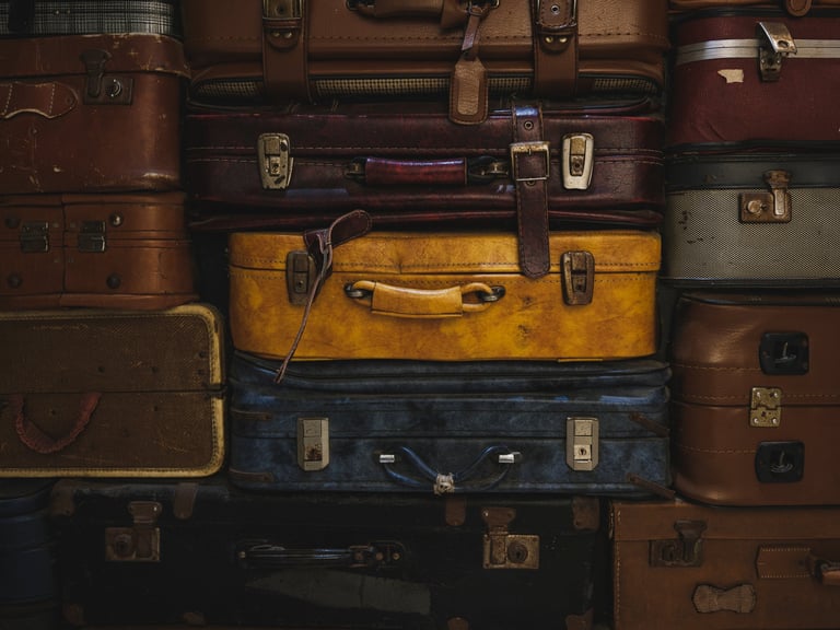 Classic vintage travel suitcases with nostalgic adventure style